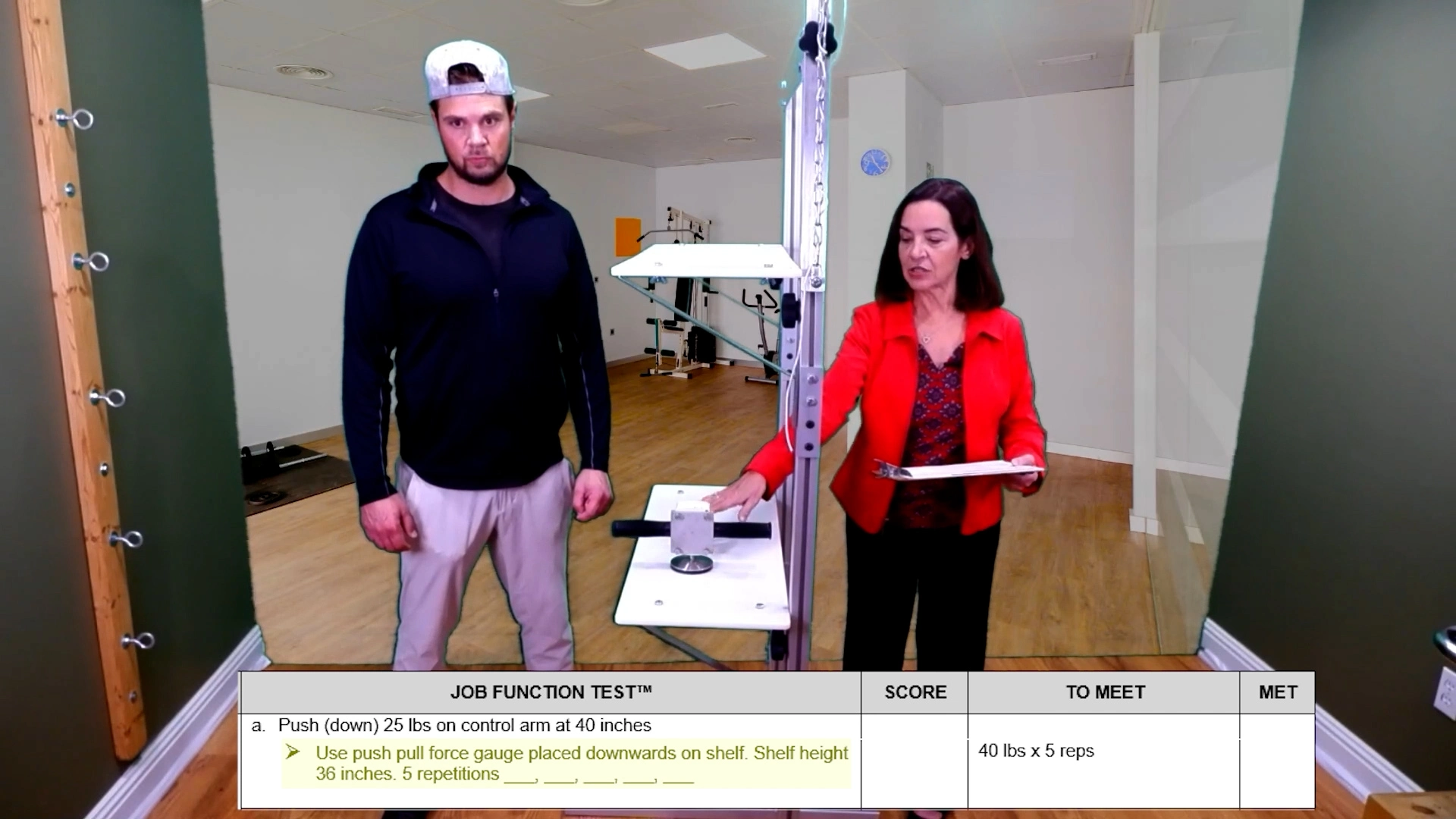 A man is performing a Job Function Test to push down on a Force Gauge to simulate a job function.